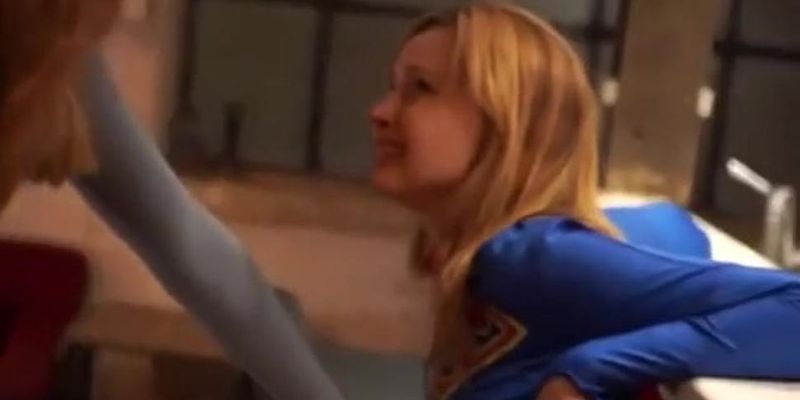 Superheroines Supergirl and Power Do Battle with Each Other