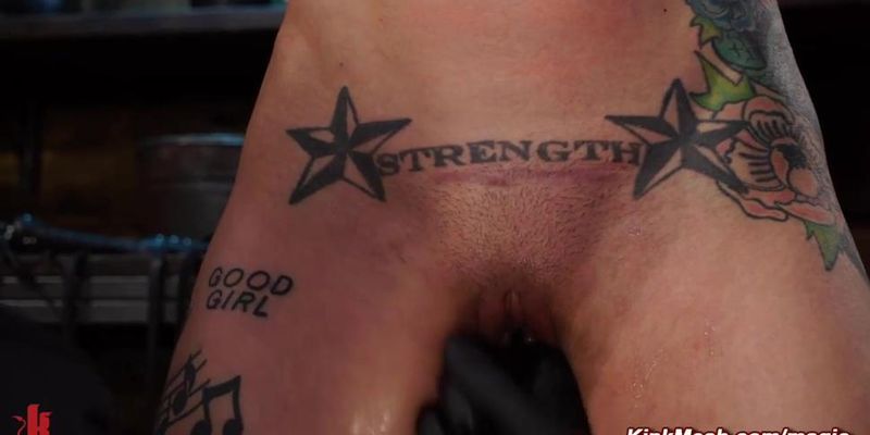 Tattooed skinny slave suspended in the air and toyed