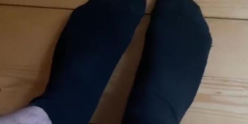 Shy boy shows his feet in dirty socks for satisfaction of his footfetish